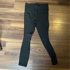 Athleta Salutation Stash Tight - size medium